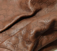 Gucci Sukey GG Embossed Leather Tote – Brown